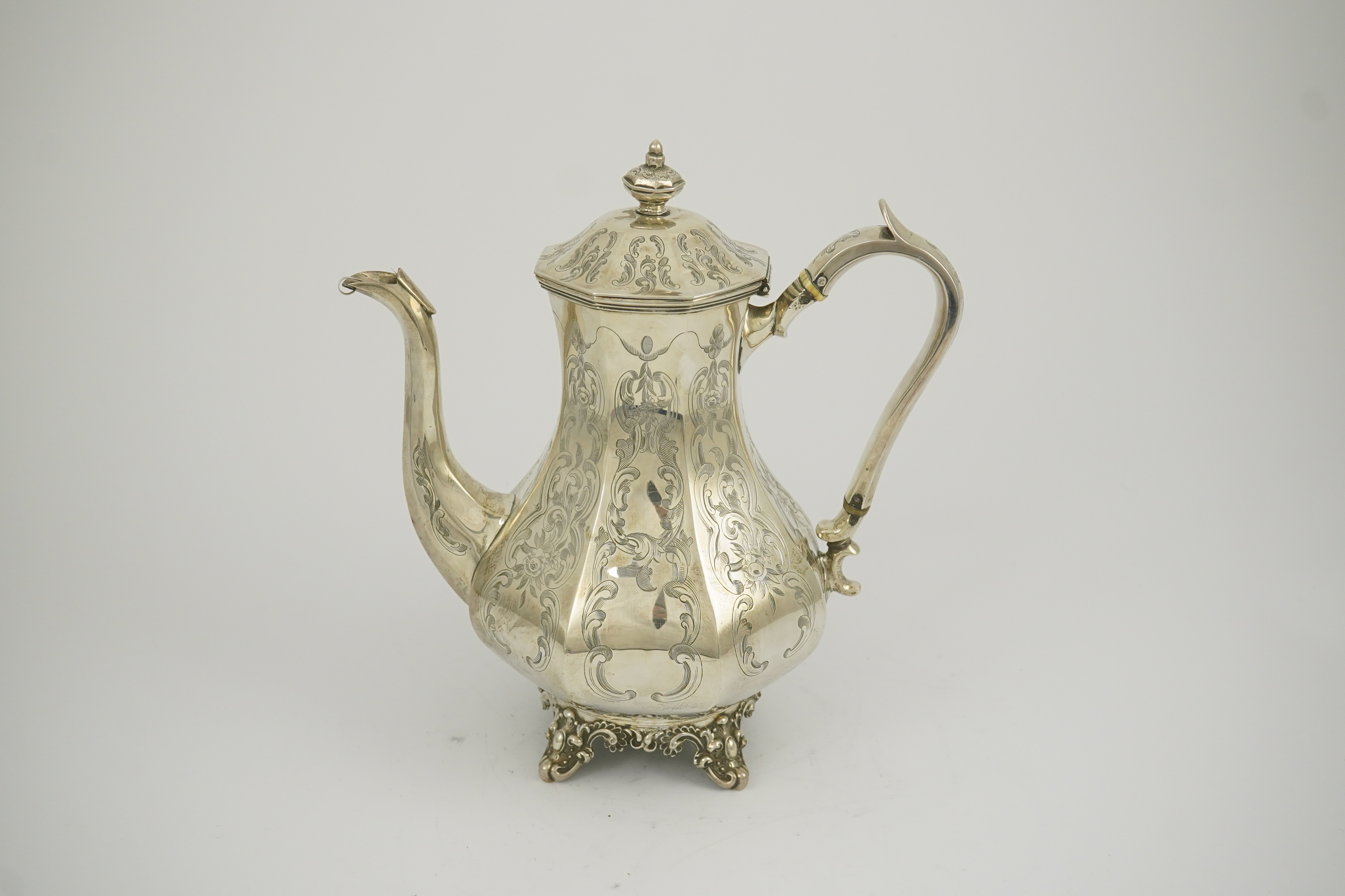 A Victorian engraved silver coffee pot, by John Welby